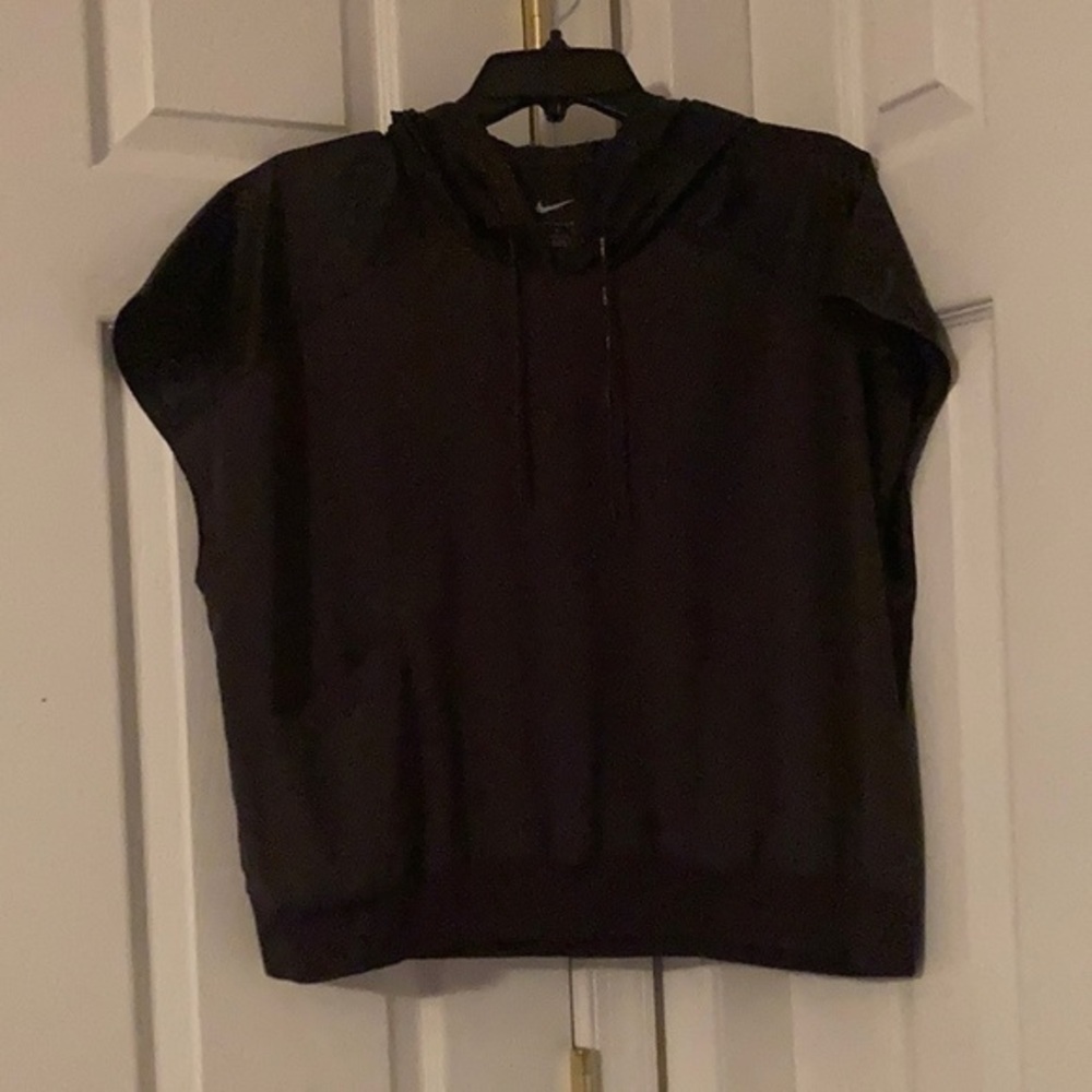 Nike woman’s lightweight short sleeve Rain Jacket - Size M